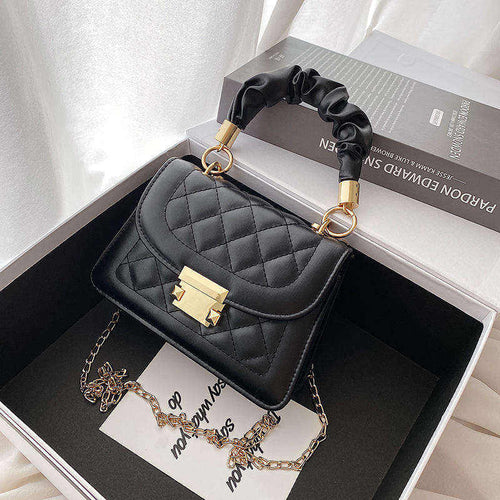 The Lyra Quilted Top-Handle Bag
