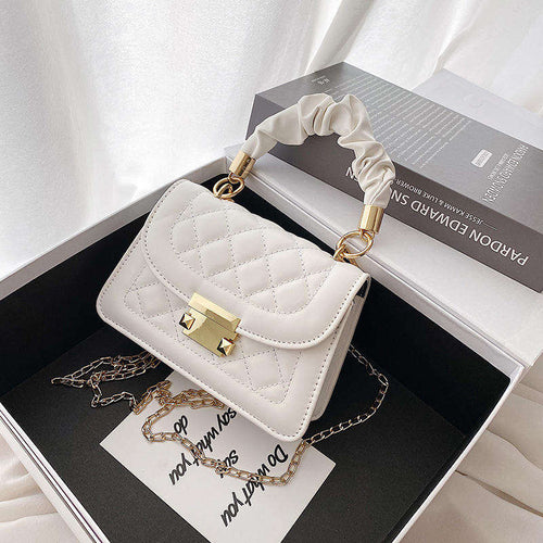 The Lyra Quilted Top-Handle Bag
