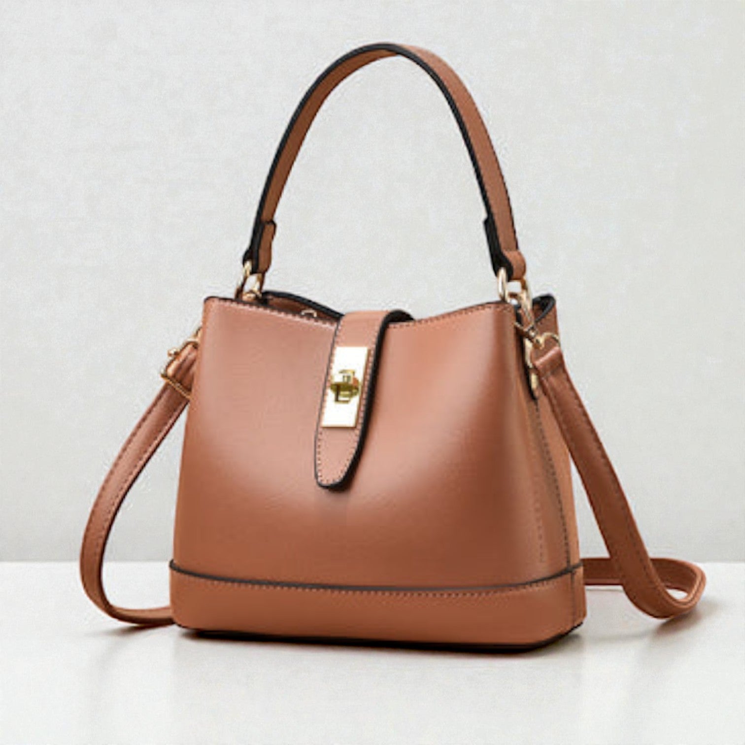 The Mira Lock Crossbody Bag