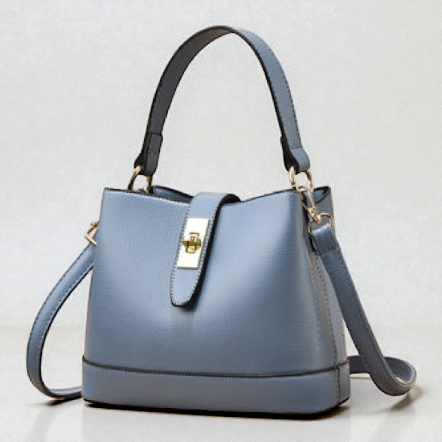 The Mira Lock Crossbody Bag